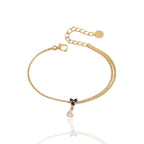 Bracelet en acier inoxydable avec pendentif rond serti de cristaux scintillants