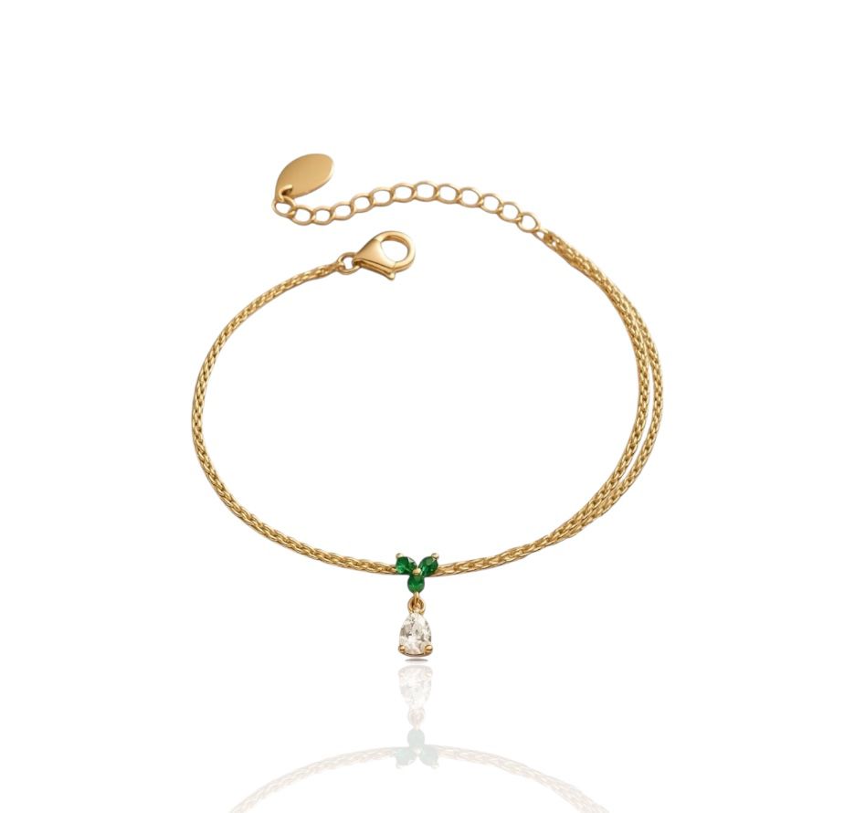 Bracelet élégant et féminin avec détails brillants et chaîne asymétrique